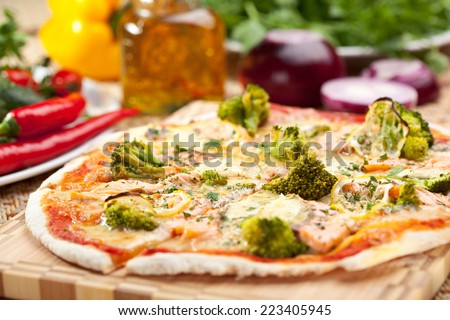 Pizza with Salmon, Broccoli, Cheese and Lemon