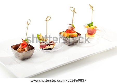 Delicious Buffet Food on White Dish