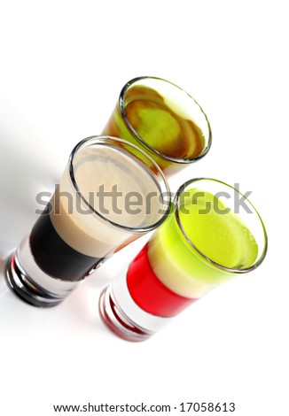 Layered Alcoholic Cocktails Isolated on White Background