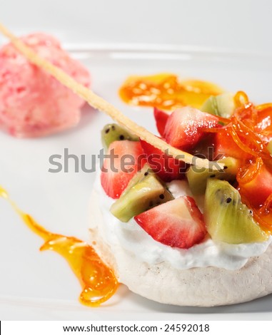 Meringue with Cream and Fresh Berries and Fruit with Strawberry Sorbet