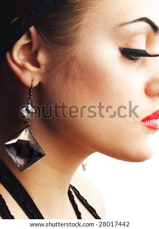 Beauty Model with Earring and False Eyelashes