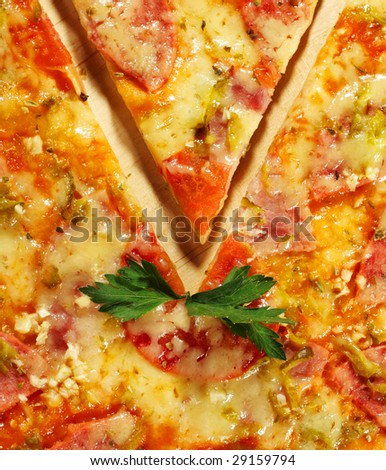 Meat Pizza with Tomato and Greens on a Wood Tray