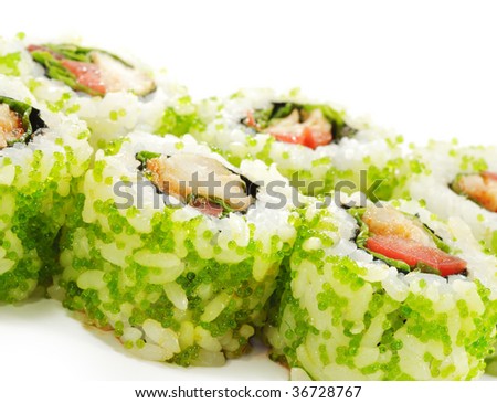 Japanese Cuisine - Sushi Roll with Sea Bass, Tomato and Green Flying Fish Roe