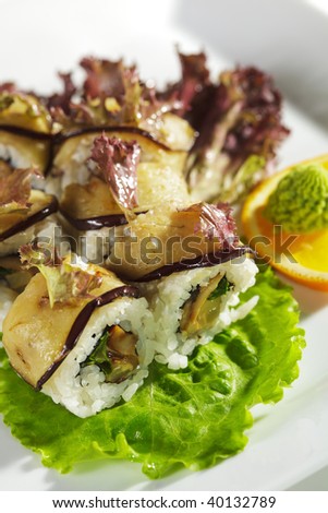 Autumn Roll - Mushrooms and Green Salad inside. Eggplant outside. Topped with Red Salad Leaf