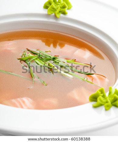Rice Soup with Salmon. Garnished with Leek and Wasabi