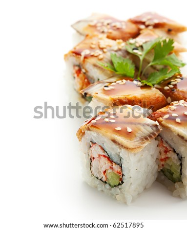 Maki Sushi with Crab Meat - Roll made of Crab Meat, Cucumber and Tobiko inside. Topped with Eel
