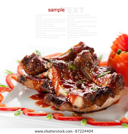Hot Meat Dishes - BBQ Ribs with Tomatoes and Spicy Sauce