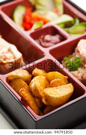 Japanese Meal in a Box (Bento) - Steamed Cutlet, Potatoes and Sweet Fruit Sushi