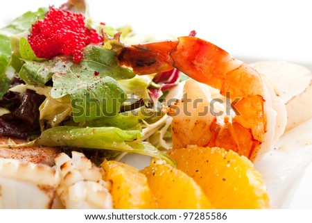Seafoods - Shrimps, Sea Scallops, Squids and Salmon. Garnished with Fresh Raw Salad Leaf and Flying Fish Roe.