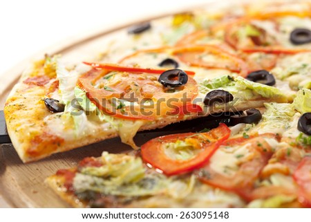 Pizza with Mozzarella, Sauce, Tomatoes and Salad Leaves