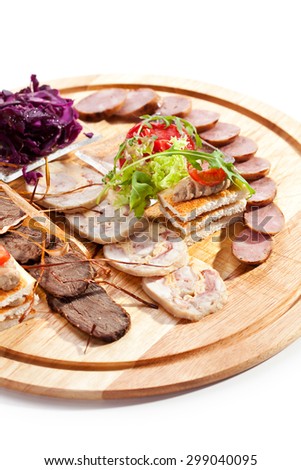 Various Meat Delicacies with Marinated Vegetables