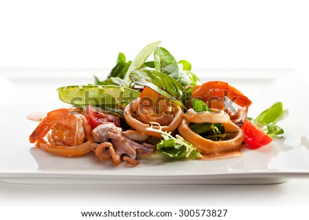 Various Seafood Salad with Freshness Green Leaf and Cherry Tomato