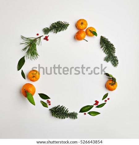 Christmas Round Frame from Natural Branches and Tangerines. Flat Lay