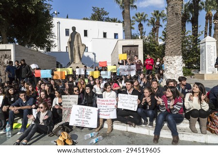 BODRUM,TURKEY-MARCH 12, 2014: Young students protesting the killing of Berkin Elvan, the child victim of Gezi Protests. 16-year-old Berkin was shot dead by the Police forces. Taken on March 12, 2014