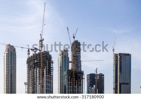 Dubai, United Arab Emirates - Feb 23, 2012: View of Emaar district, downtown Dubai on February 23rd. The district hosts some of the most famous landmarks of Dubai; Burj Khalifa, Dubai Mall etc.