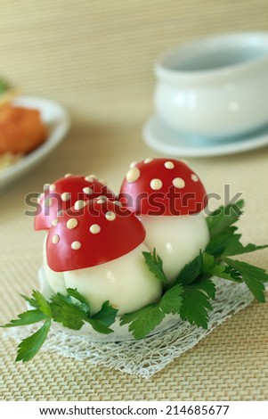Chicken egg decorated under a fly-agaric