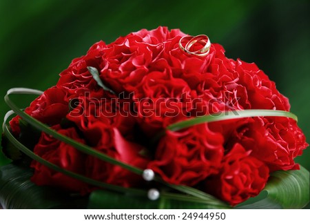 stock photo red wedding bouquet on green background