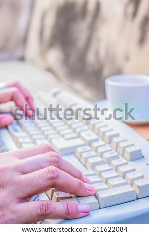people who are typing on keyboard