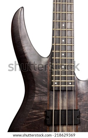 Vintage soundboard black electric bass guitar isolated over a white background