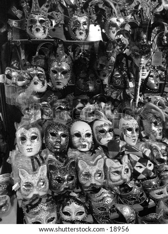 Carnival masks in a Venetian shop. black and whit e image would be great with a color tone or as a faded background for text.