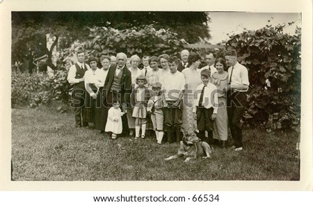 Family portrait, people of all ages, circa 1925.