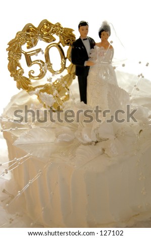 Golden wedding anniversary cake isolated.