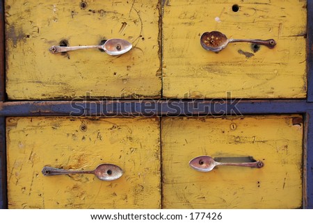 Antique spoons made into rustic  drawer handles.