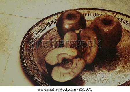Apples On A Silver Platter with a faux alternative process for an aged fine art quality.  The textural stains in this image were created using my Urban Textures image # 189491