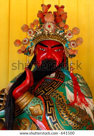Kwan Tai-the red faced Chinese buddhist god of war revered for integrity and loyalty.