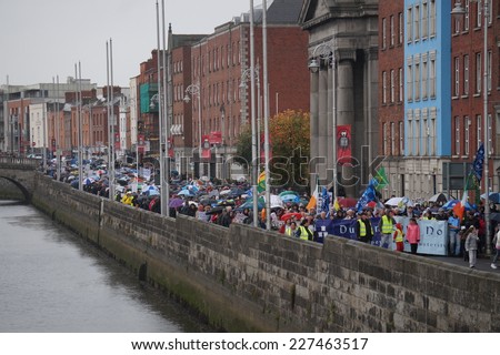 DUBLIN - NOVEMBER 1: Protesters march to the center of Dublin city in anger of the government introducing a second charge for household water on November 1, 2014 in Dublin Ireland.