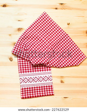 towel white red squares on wooden background