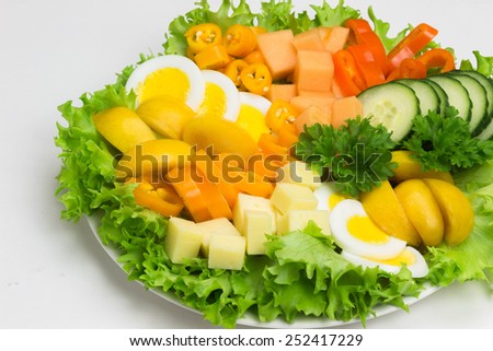 Yellow salad on white