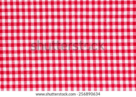 Red and white tablecloth, texture background, top view