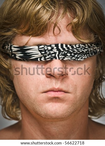 Portrait of man like playing blind man\'s buff