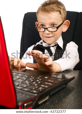 http://image.shutterstock.com/display_pic_with_logo/253174/253174,1287955839,1/stock-photo-kid-in-glasses-on-laptop-63722377.jpg