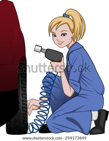 Female car mechanic in blue coveralls fixing a car wheel