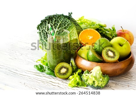 Fresh green detox vitamin  smoothie on white background for healthy snack