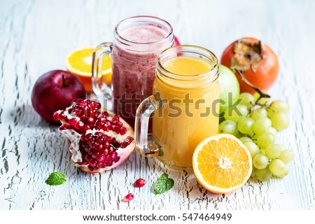 Berry smoothie, healthy juicy vitamin drink diet or vegan food concept, fresh vitamins, homemade refreshing fruit beverage