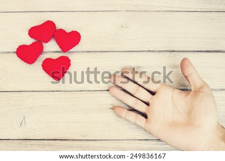 vintage Need of Love,hand and heart  on wood