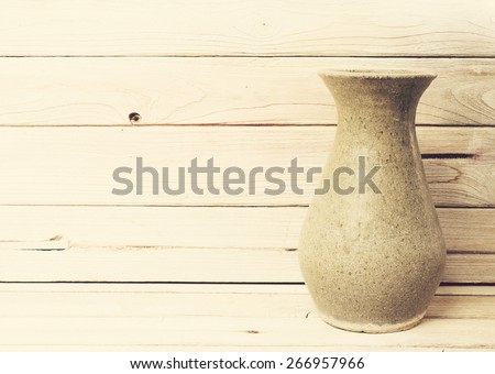Old Vase on wood