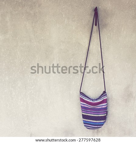 Vintage,Shoulder Bag hanging on the wall