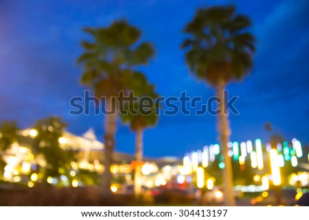 blur night garden with bokeh light Background for use as Background