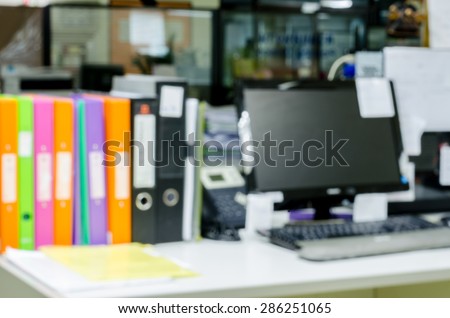 abstract blur background table work in office with computer pc