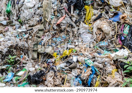 NAKHON PHANOM, THAILAND - JUNE 25: Municipal waste disposal by open dump procese.  Dump site at Nakonpanom on JUNE 25, 2015 in NAKHON PHANOM PROVINCE THAILAND