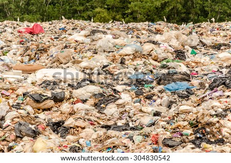 SONGKHLA, THAILAND - AUGUST 4: Municipal waste disposal by open dump procese.  Dump site at Hatyai Songkhla on AUGUST 4, 2015 in SONGKHLA PROVINCE THAILAND