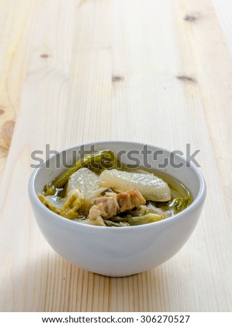 Chinese vegetable stew, mixture of vegetables and pork on wooden background