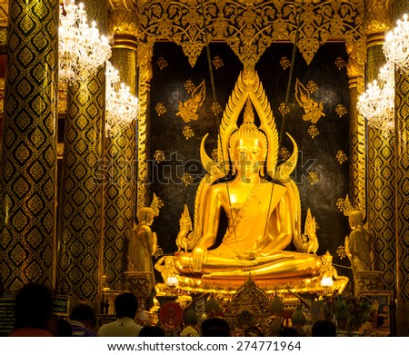 PHITSANULOK, THAILAND - MARCH 28: The famous beautiful Thai art, golden buddha statue, known as Phra Buddha Shinnaraj, in Phitsanulok, Thailand, was taken on March 28, 2015.