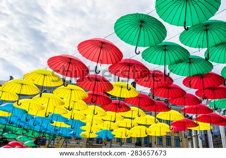 Hanging flag-coloured umbrellas show at Kyiv day. Kyiv, Ukraine.