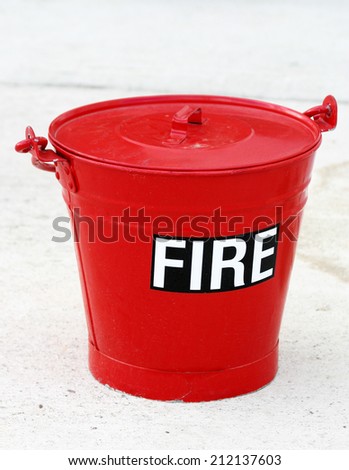 An old retro fire bucket against a high key background.