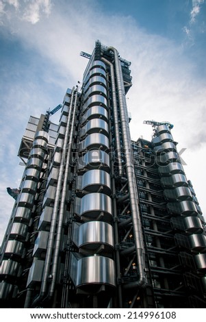 London, UK - 25 August, 2005: Low angle, full view of the iconic Lloyds building, London. The building is a leading example of Bowellism architecture.